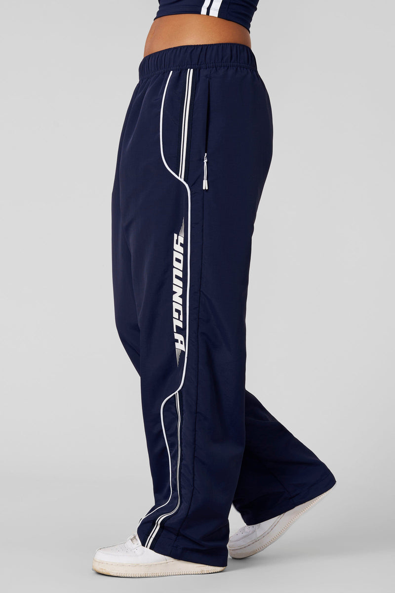 W204 - Drift Track Pant— bold racing-inspired side design with a relaxed, oversized fit for sporty, everyday style and comfort in Navy