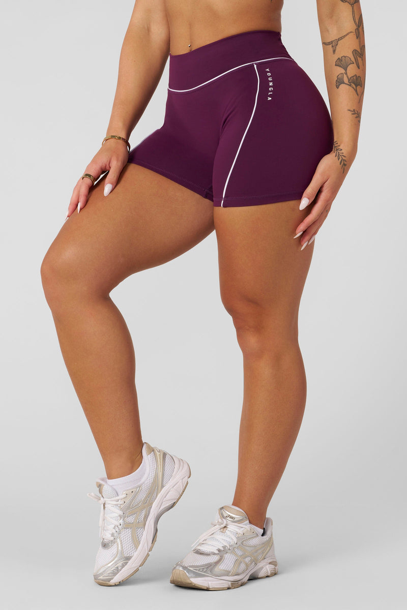W161 - Elevate outline Shorts 5" New Colors - Women's compressive workout shorts in smooth brushed fabric that stay-in-place fit, perfect for gym in colour Grape.