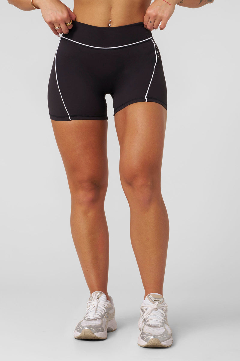 W161 - Elevate outline Shorts 5" New Colors - Women's compressive workout shorts in smooth brushed fabric that stay-in-place fit, perfect for gym in colour Black/White.