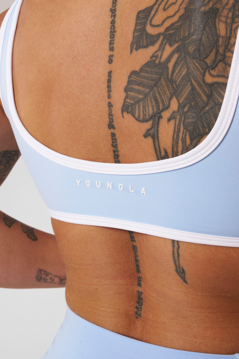 W366 - Elevate outline Bra for Women while removable pads offer customizable coverage color in Light Blue.