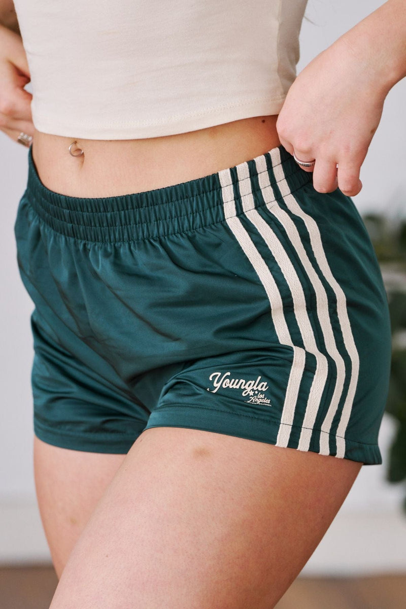 W116 Day-Off Shorts for women in 100% polyester with comfy elastic waistband that stretches with you—perfect for lounging, running errands in color Green.