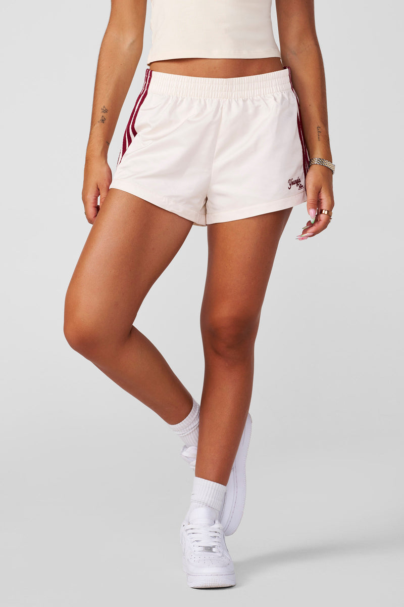 W116 Day-Off Shorts for women in 100% polyester with comfy elastic waistband that stretches with you—perfect for lounging, running errands in color Cream.