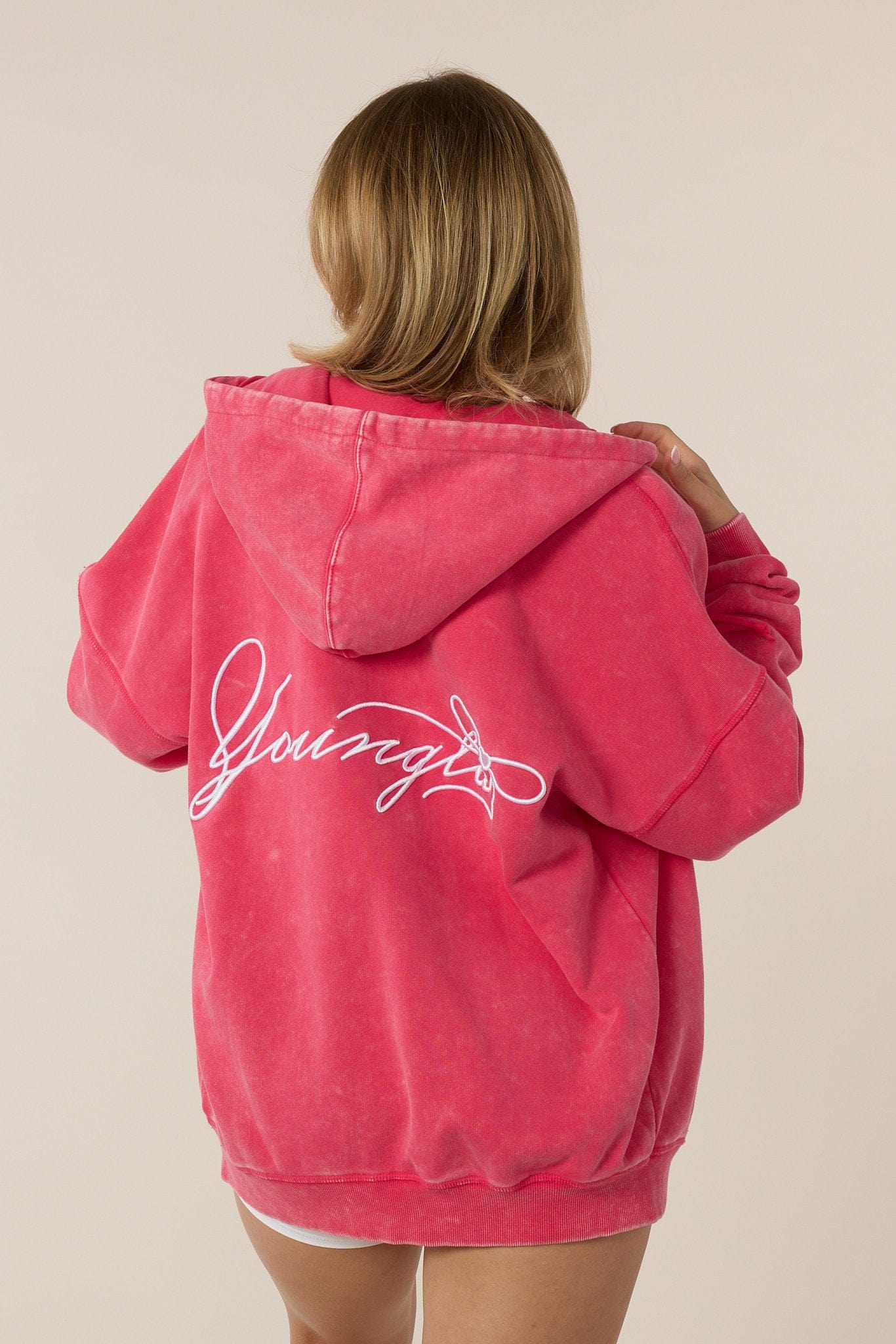 W533 Flashback Zip Hoodie for women with bold color blocking and an effortlessly oversized fit in color Hot Pink.