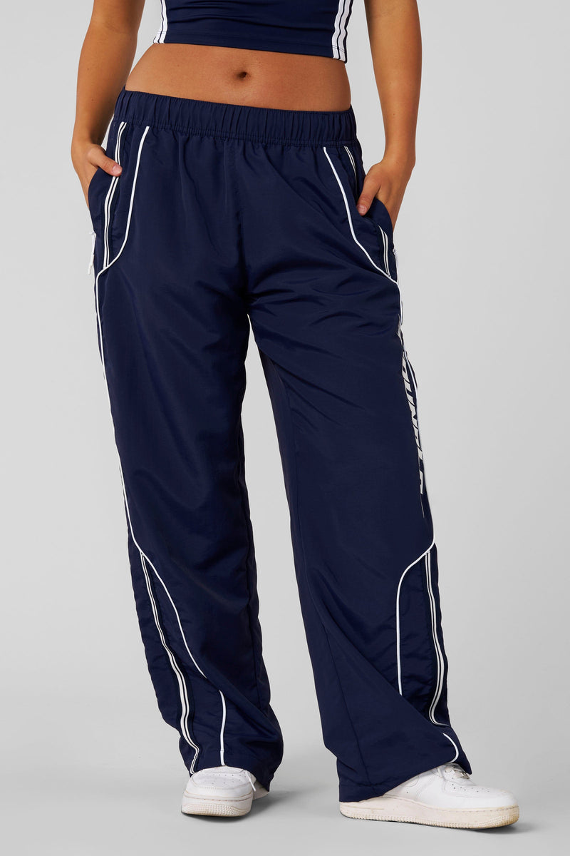 W204 - Drift Track Pant— bold racing-inspired side design with a relaxed, oversized fit for sporty, everyday style and comfort in Navy
