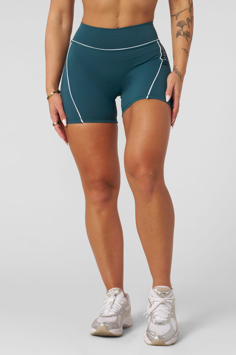W161 - Elevate outline Shorts 5" New Colors for women they offer a sculpted fit that stays in place—no adjustments needed in color Teal.