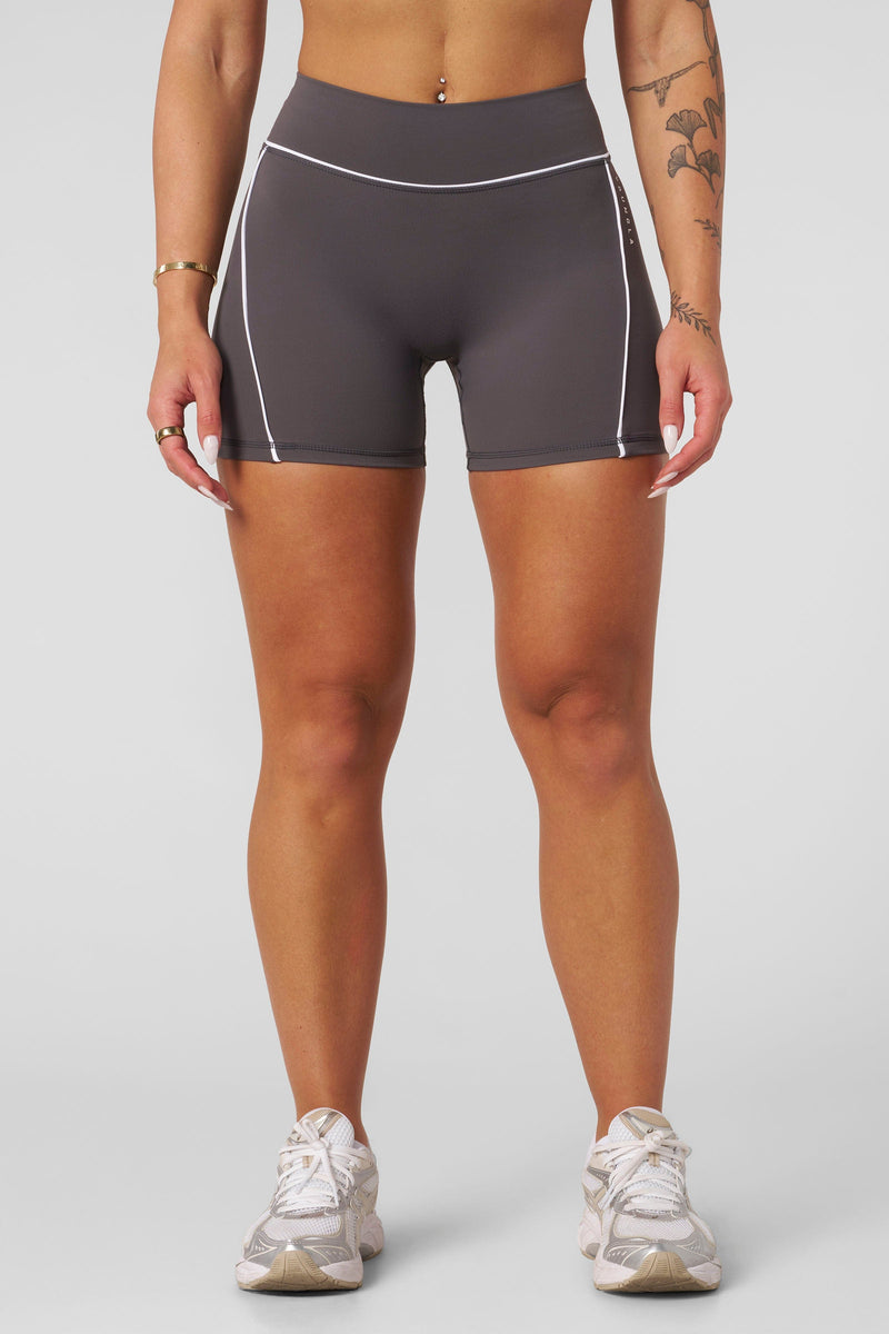 W161 - Elevate outline Shorts 5" New Colors for women they offer a sculpted fit that stays in place—no adjustments needed in color Charcoal.