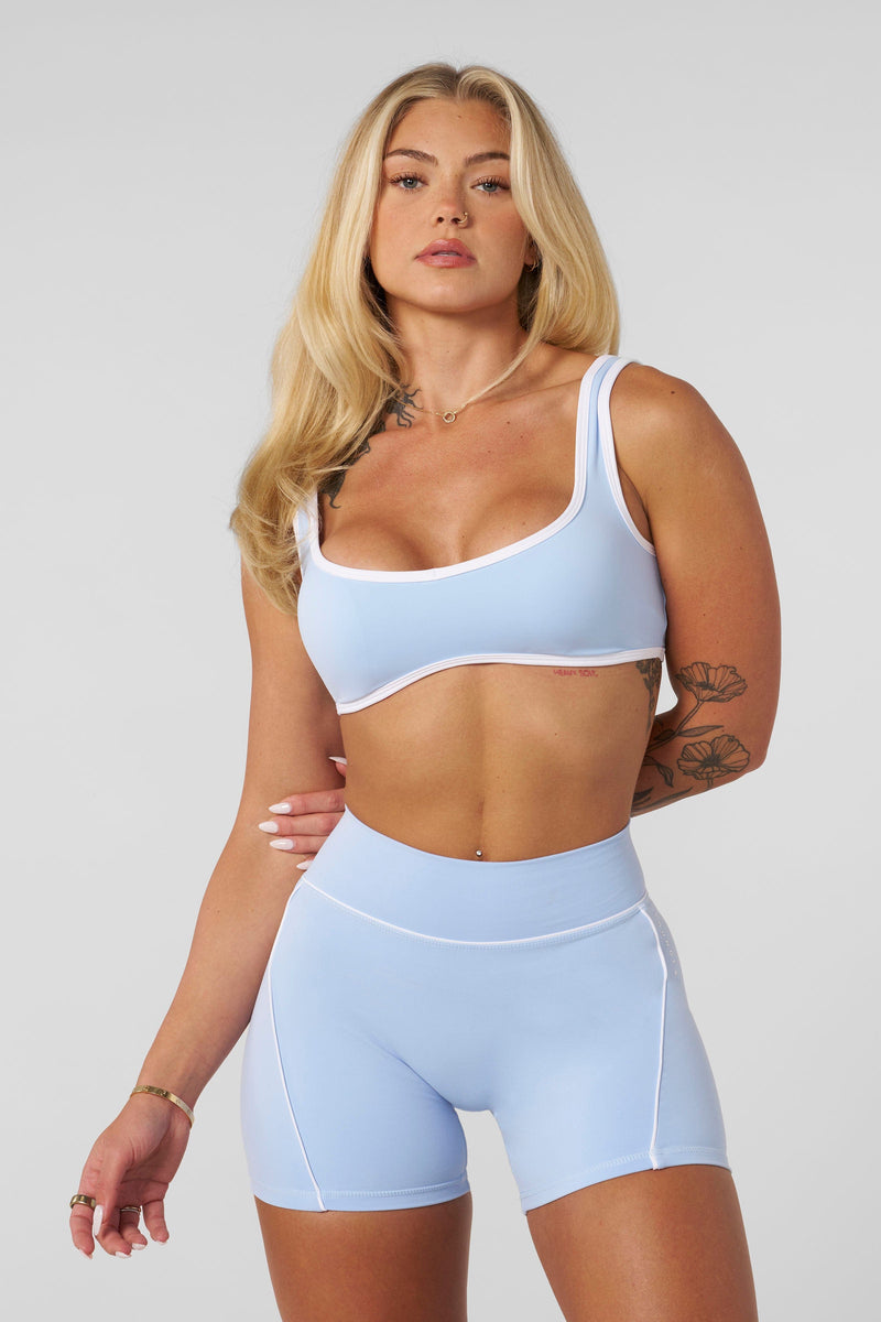 W366 - Elevate outline Bra
— soft, brushed fabric with a sweetheart neckline, removable pads, and a comfortable fit for lounging, light activity, or layering in Light Blue