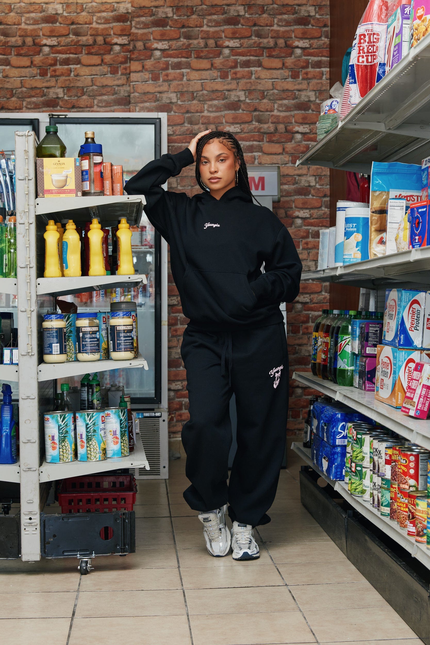 W566 Soft Serve Hoodie for women with super soft, fluffy fleece and featuring a fun puff print in color Black.