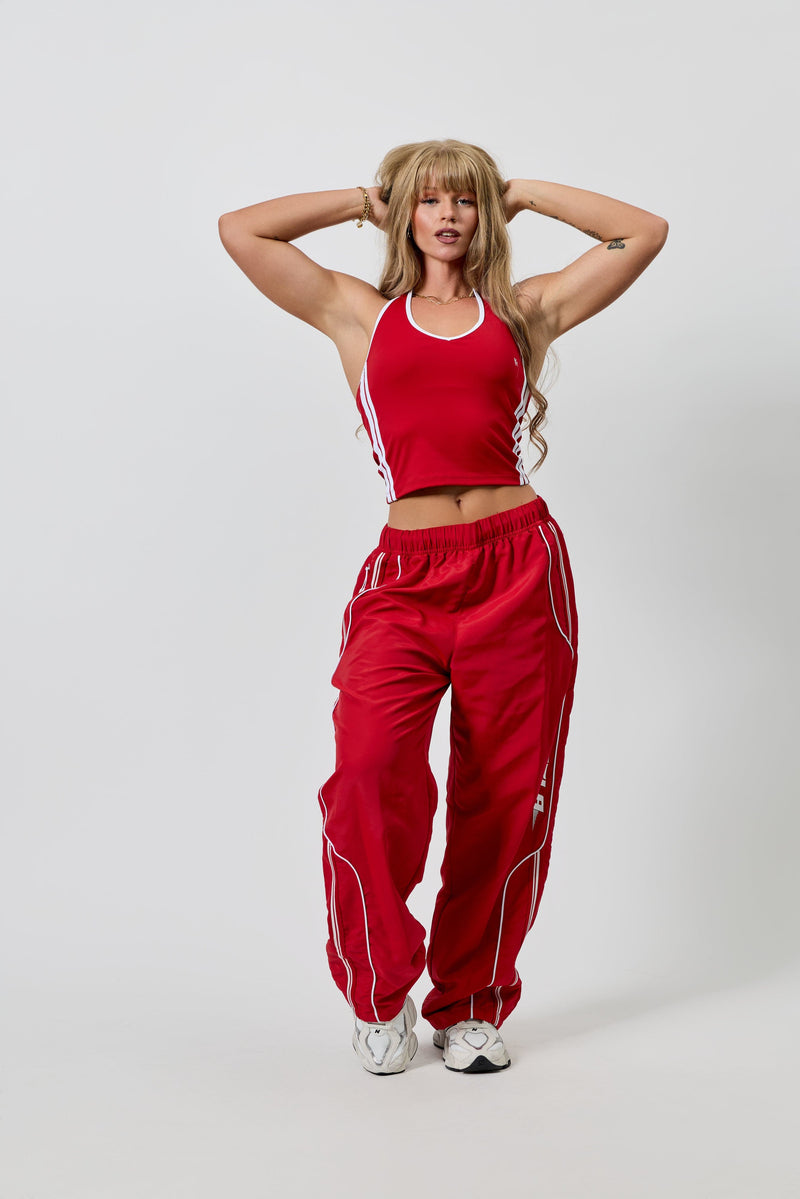 W204 - Drift Track Pant— bold racing-inspired side design with a relaxed, oversized fit for sporty, everyday style and comfort in Red