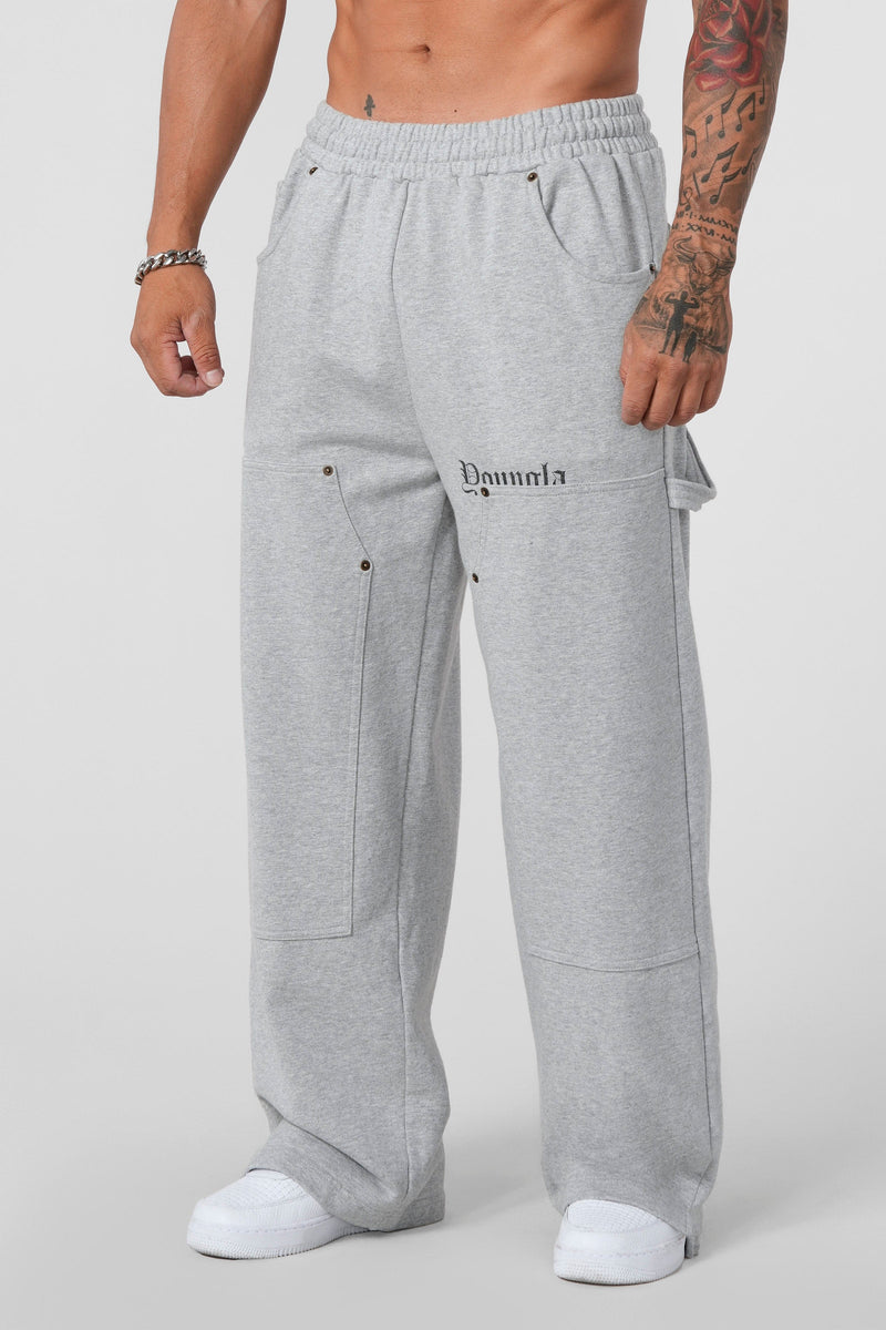 2055 - Carpenter Sweats for Men: 100% cotton heavyweight 460 GSM baggy sweats with workwear-inspired stitch lines, premium feel, and comfortable utility design in color Heather Grey.