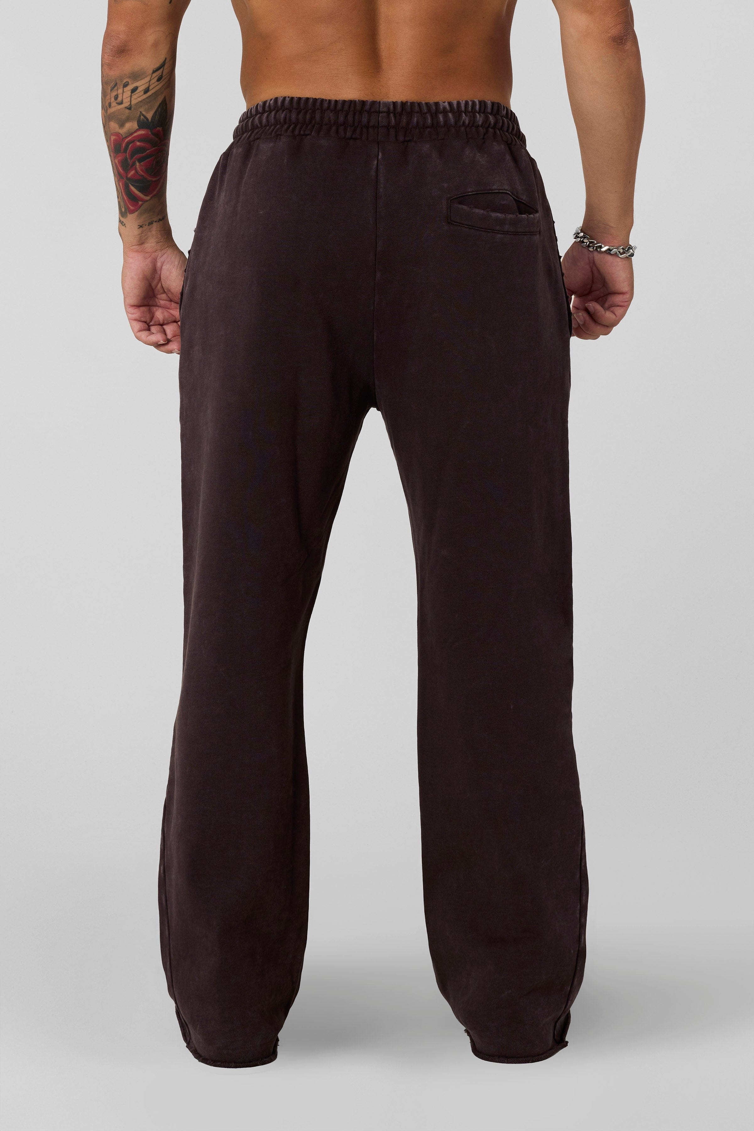 2077 - Flare Sweats - Heavyweight fleece sweats with structure and warmth. Minimal branding and clean lines create a bold, everyday-ready silhouette in brown Wash.