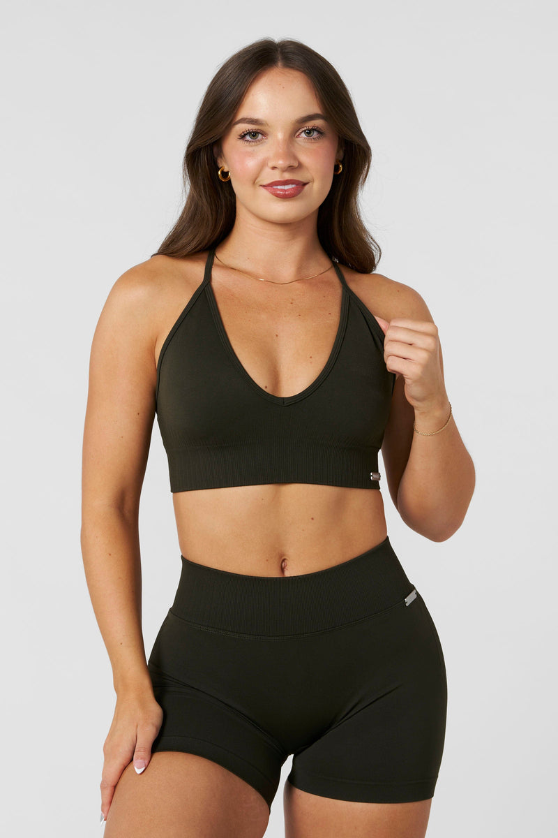 W367 - Sculpt Seamless Plunge Bra - Medium Impact Bra — ultra-soft seamless design with a flattering deep V-neckline and removable padding for adjustable support in colour Olive.