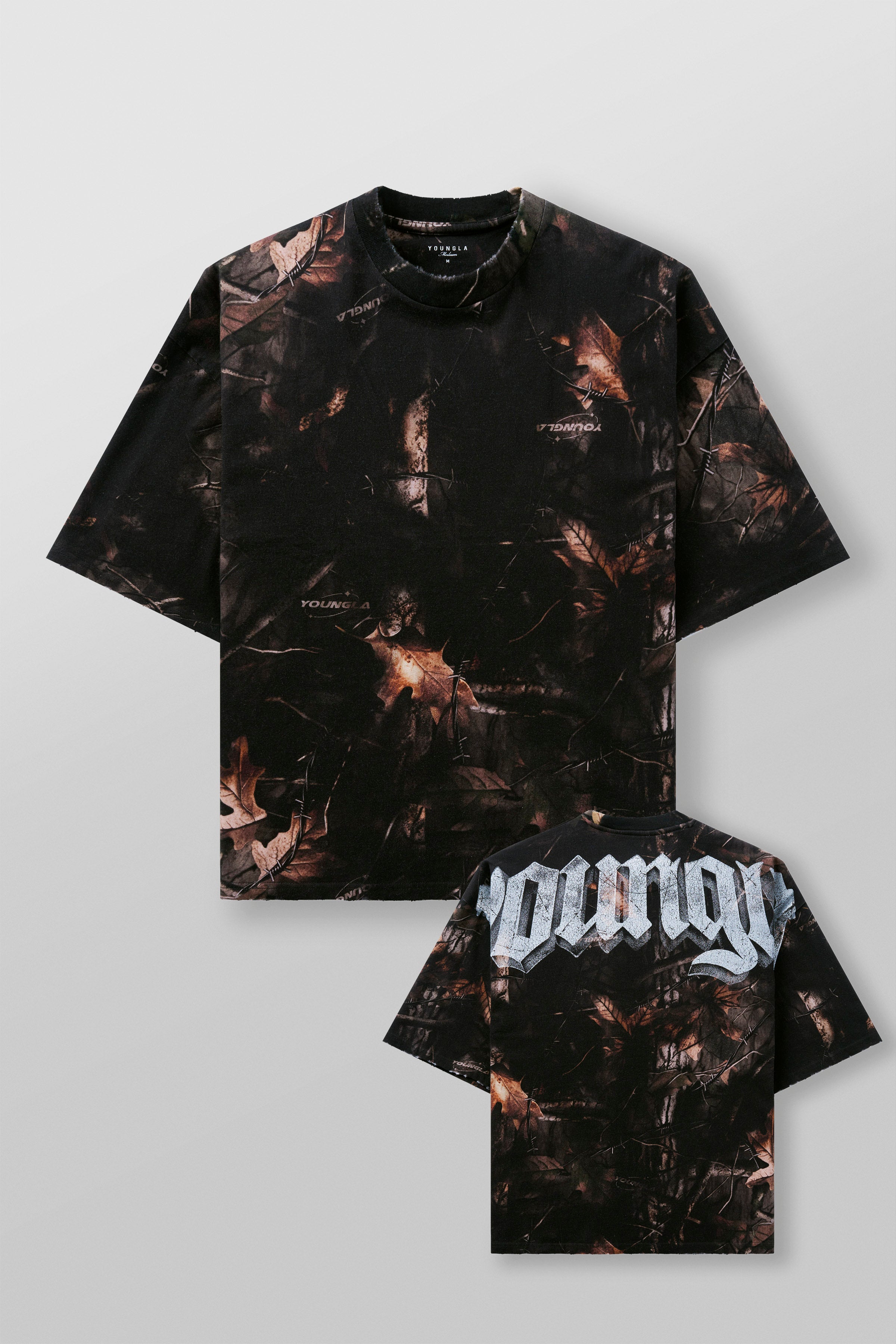 4159 - Huge Tees for Men: Bold gothic logo tee with boxy draped fit, vintage faded 100% cotton, and heavyweight presence in color Black Tree Camo.