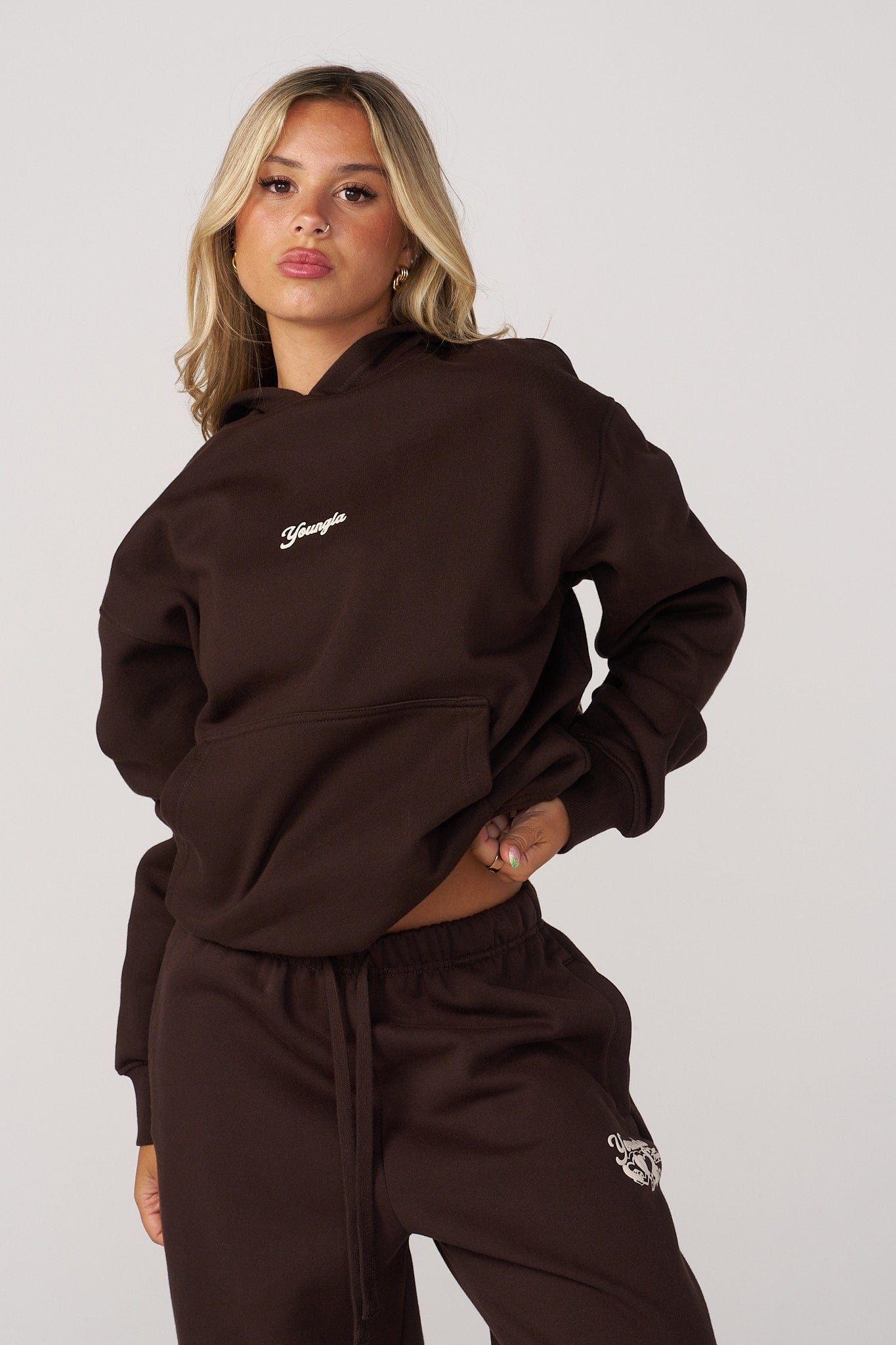 W566 Soft Serve Hoodie for women with super soft, fluffy fleece and featuring a fun puff print in color Brown