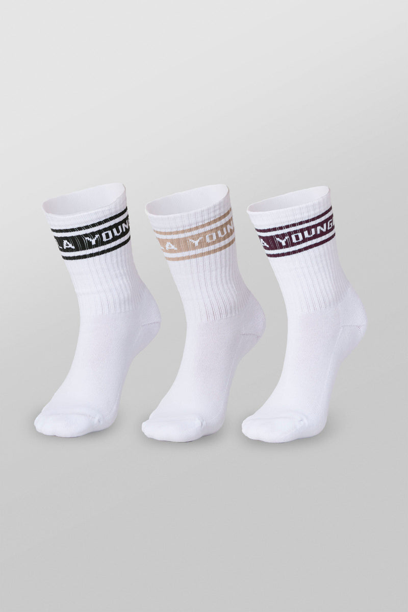 W638 - Elevate crew socks for Women With a compressive feel that hugs your foot and a classic crew height in color Purple Pack.
